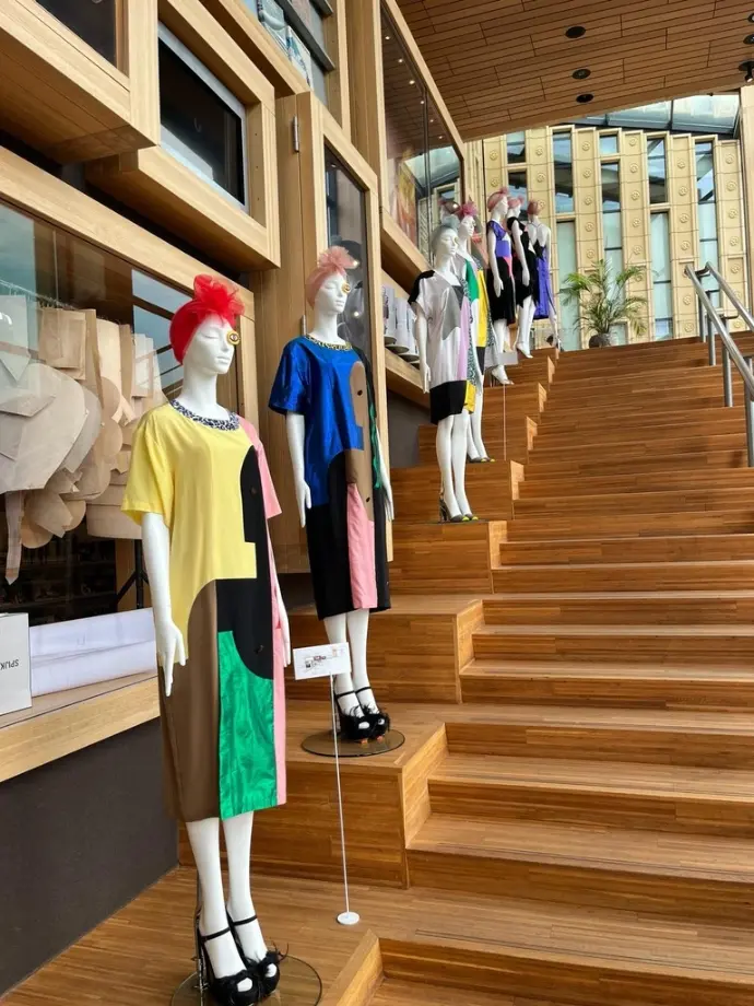 Wide shot of the State of Fashion exhibition space featuring the Spijkers en Spijkers anniversary collection on BINK rental mannequins