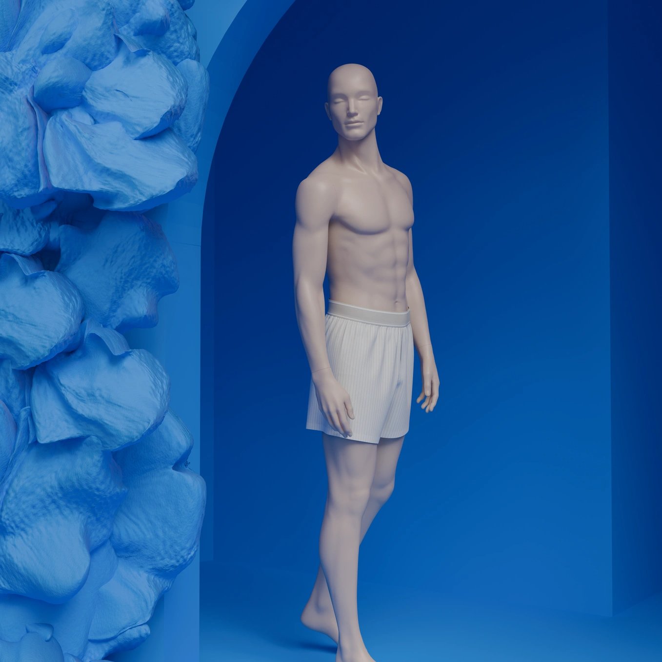 Male mannequin with a defined torso in white boxer shorts walking in a deep blue arched setting with sculpted blue floral shapes